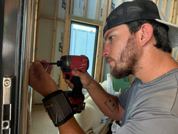 Framing contractor wearing the band