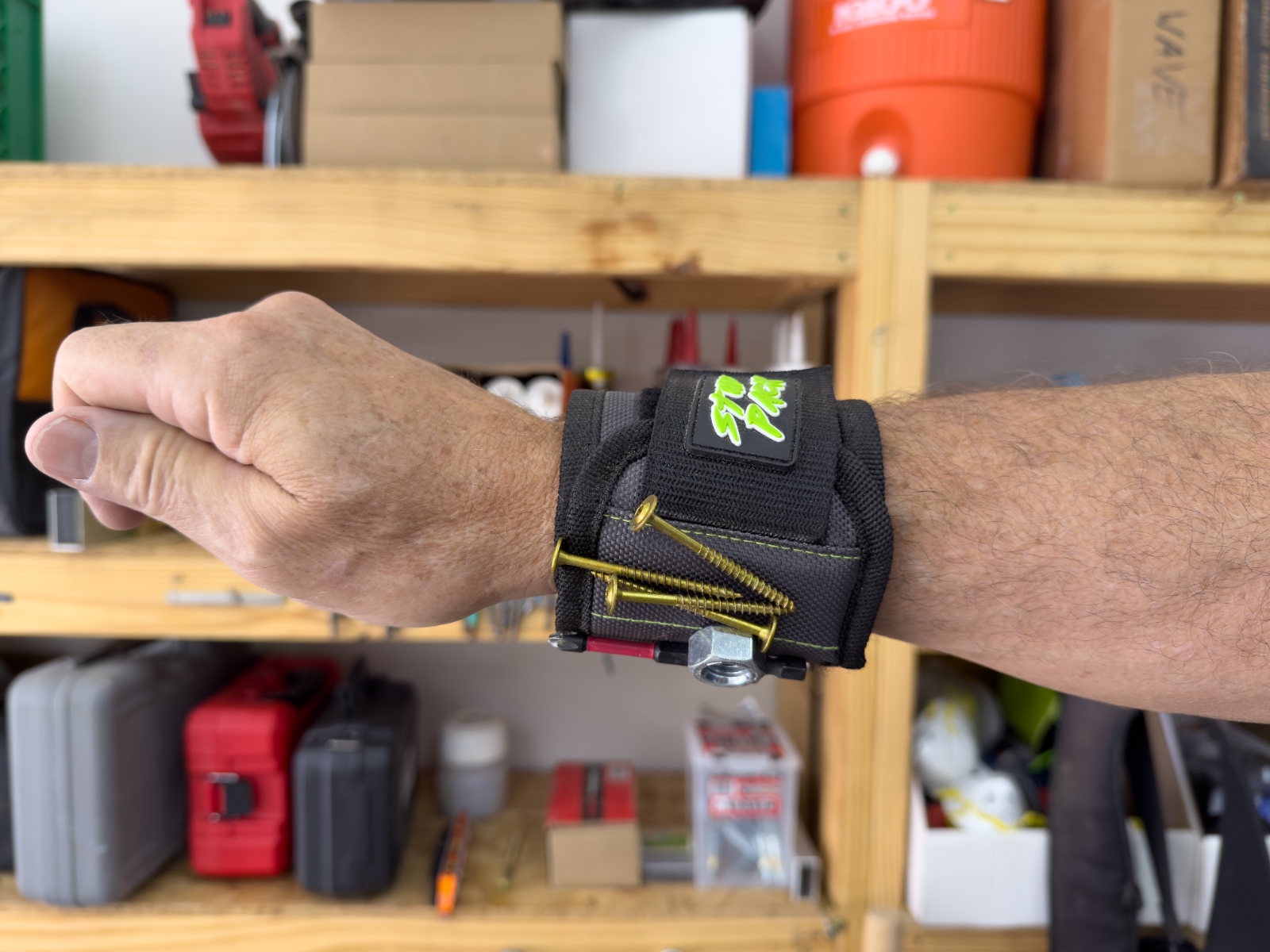 Stud Pack band loaded with screws on a tradesman's wrist